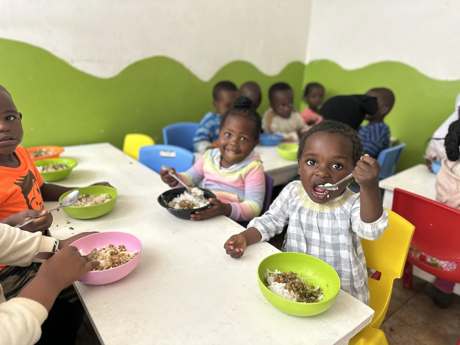 Children sharing a meal around the table
